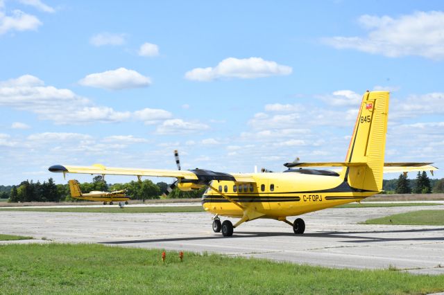 De Havilland Canada Twin Otter (C-FOPJ) - With her sister ship C-GOGC, getting ready for another rabies-vaccine drop around southwestern Ontario.