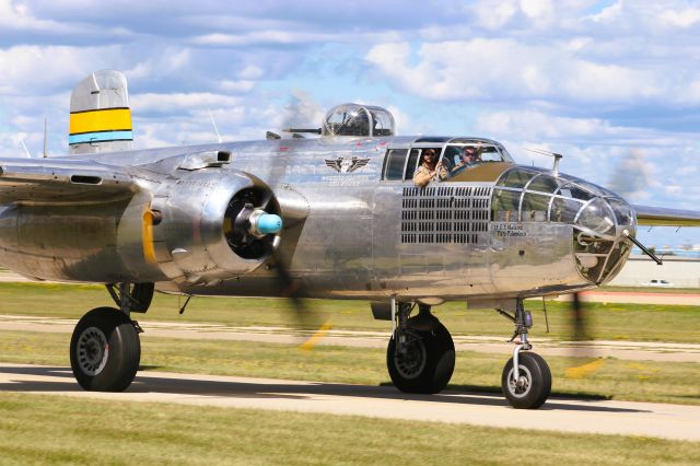 North American TB-25 Mitchell (N27493) - CAF Flight Crew definitely enjoying the taxi to take-off. B-25J Miss Mitchell served in the 310th Bomb Group, 57th Bomb wing 12th air Force in North Africa & Italy in WW 2. This B-25 was painted to represent that plane.   See below the excellent history provided by "Gorsedwa"