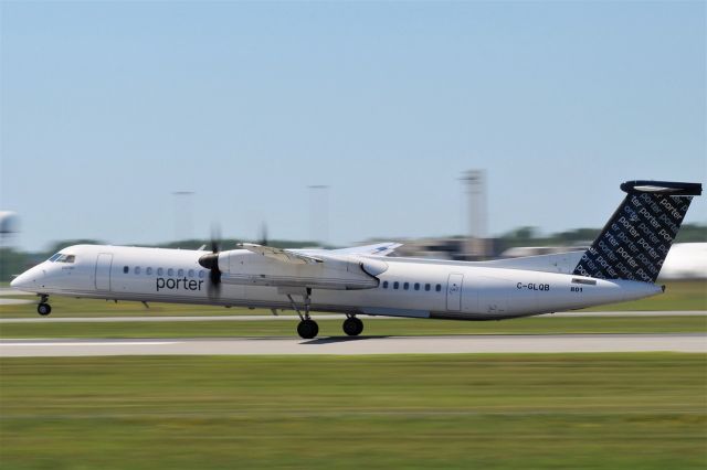 de Havilland Dash 8-400 (C-GLQB) - A Porter Dash 8 rotates off of Runway 24L at CYUL.