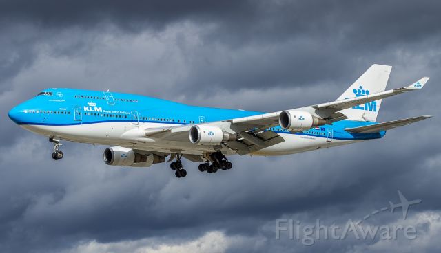 Boeing 747-400 (PH-BFN) - My favourite combination: dark moody background with sun behind me! KLM31 on short finals for runway 23 at YYZ arrives from Amsterdam