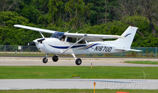 Cessna Skyhawk (N167UD) - A Cessna 172 being bumped around by strong gusts landing on Runway 30 at Chicago Executive, Taken from the viewing area.