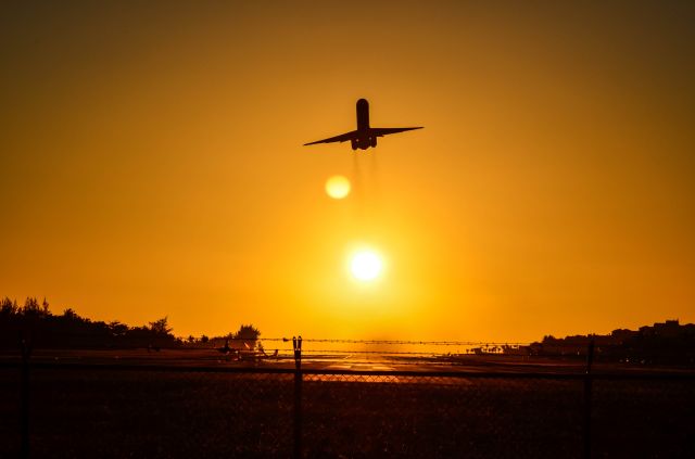 McDonnell Douglas MD-80 — - DAE taking off Runway 10, leaving the beautiful sun behind