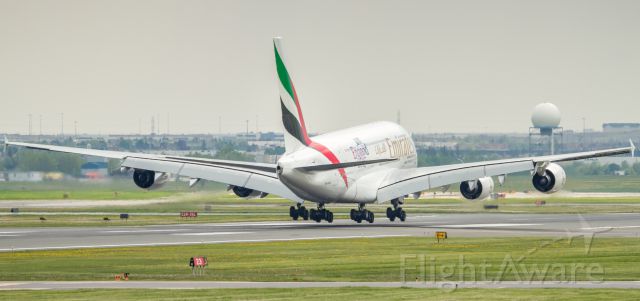 Airbus A380-800 (A6-EOH) - Emirates is the only airline to serve Toronto with the A380, here she is mere inches from touchdown on runway 23
