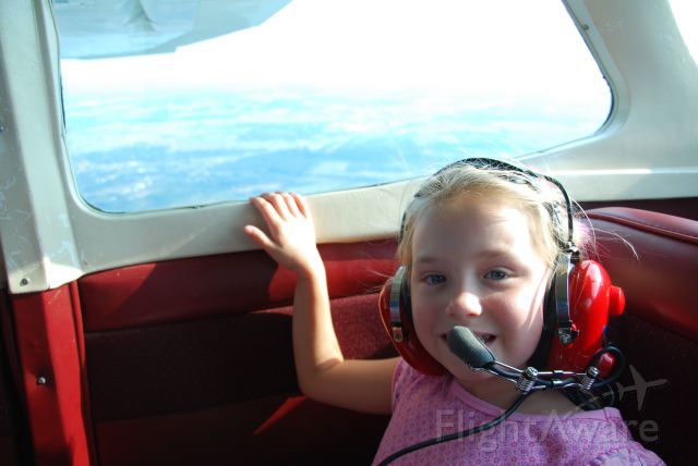 Cessna Skyhawk (N9644Q) - Taking my friend's daughter up for her first flight.  She was a talker!