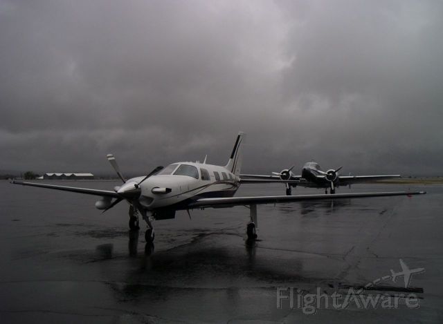 N46ME — - We just landed through that storm. It was actually a very smooth approach, just wet.