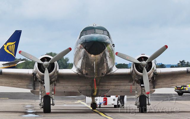 Douglas DC-3 (ZS-NTE) - springbok classic air dc-3 zs-nte being towed to the iac hanger in shannon for painting into retro aer lingus colours 10/7/17. 