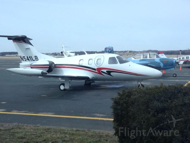 Eclipse 500 (N541LB) - Is that a T-34 in the background?