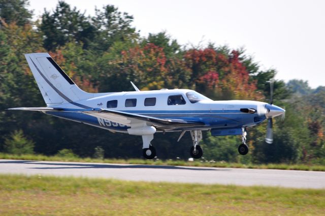 Piper Malibu Mirage (N990DP) - N99DP departs runway 24 at Hickory Regional Airport