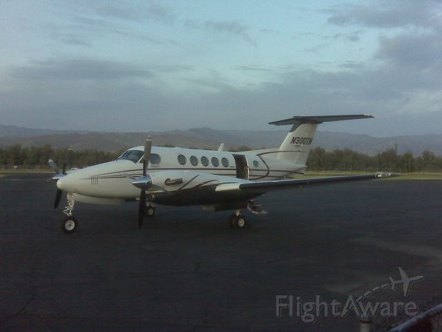 Beechcraft Super King Air 300 (N300TN) - On the ramp at UDD with camera phone.....
