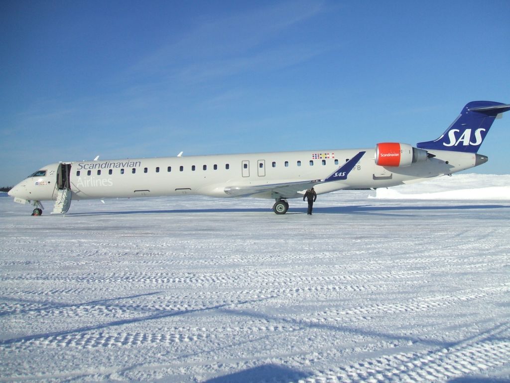 Canadair Regional Jet CRJ-900 (OY-KFB) - Parked at Irving Aviation FBO Goose Airport NL. Jan11/09