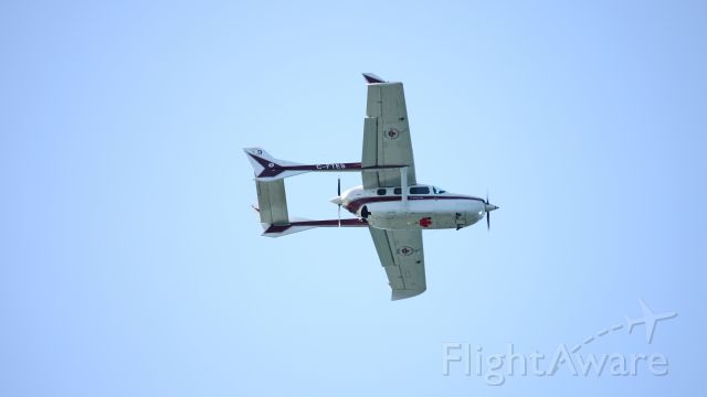 Cessna Super Skymaster (C-FTES) - Watched it fly a F1 racetrack over the area