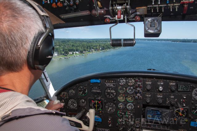 Grumman Goose (N70AL) - Flying the coastline of Cass Lake in a Turbine Goose.