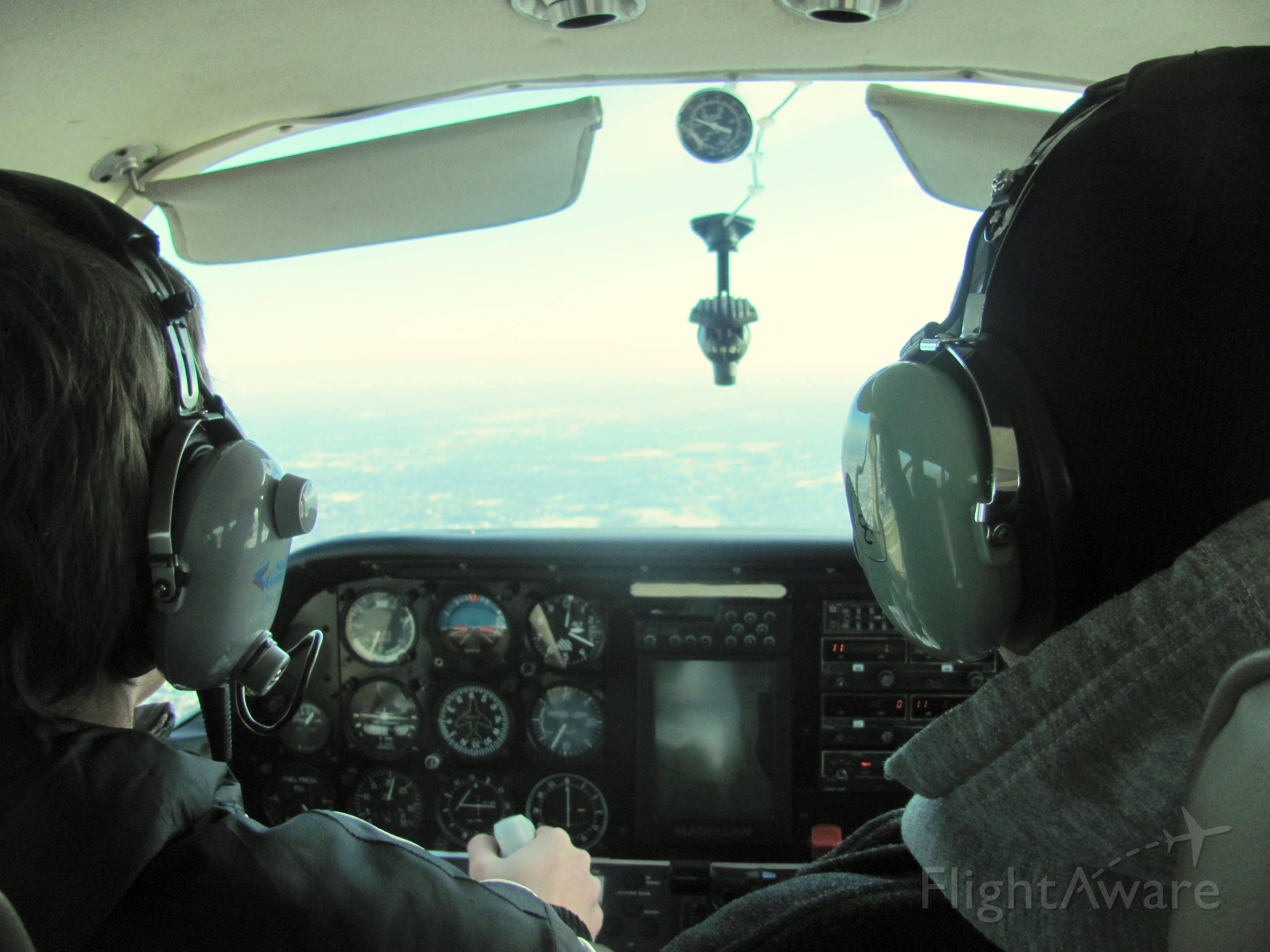Beechcraft Sundowner (N6664N) - Flying over northeast Illinois.