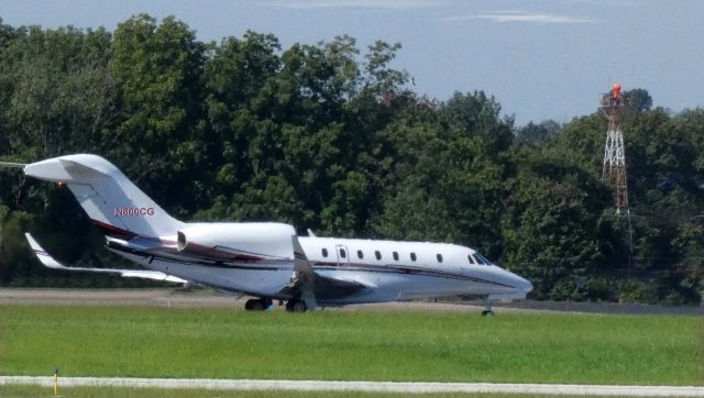 Cessna Citation X (N800CG) - On the departing paved runway is this Cessna Citation 750 in the Summer of 2021.
