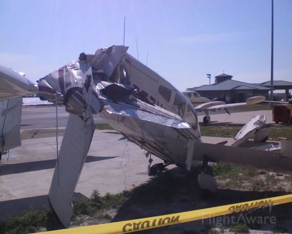 Piper Cherokee (N1957H) - KDTS in Florida had very high winds that lifted this plane off the ground and dropped it.