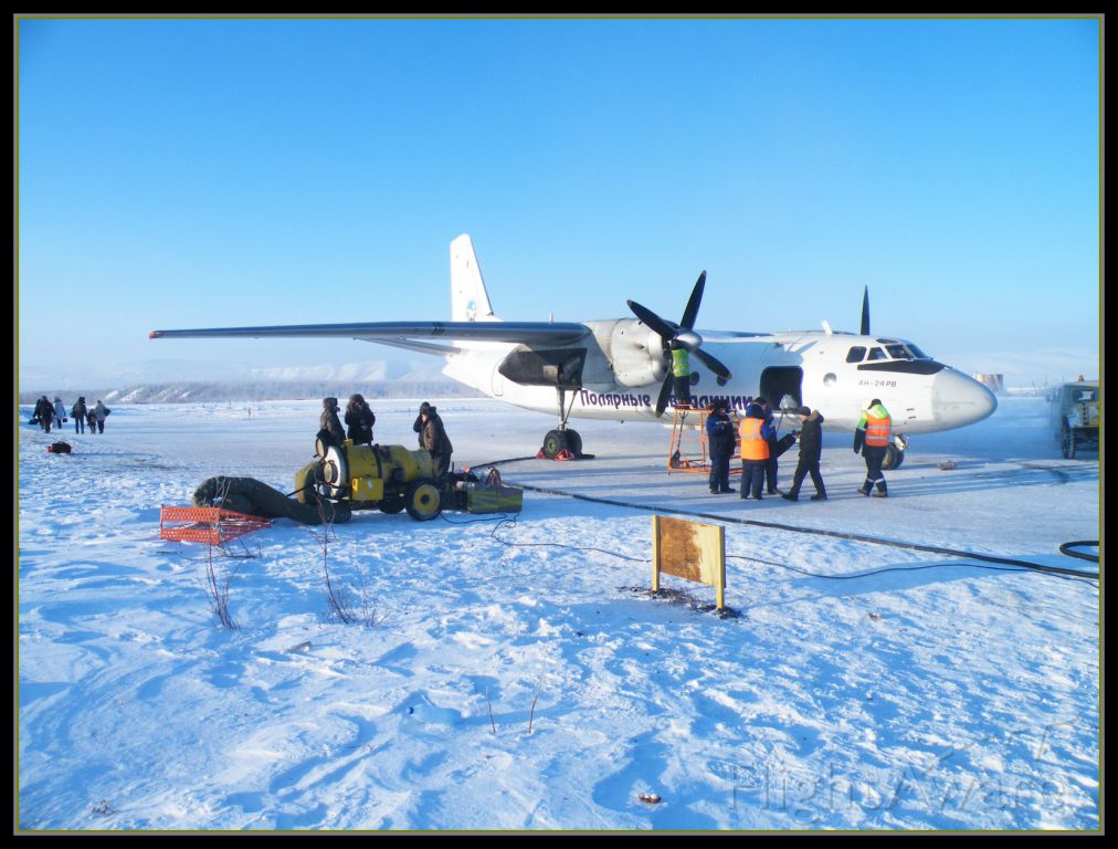 Antonov An-24 (RA-47357) - -47C Changing flights to MI-8