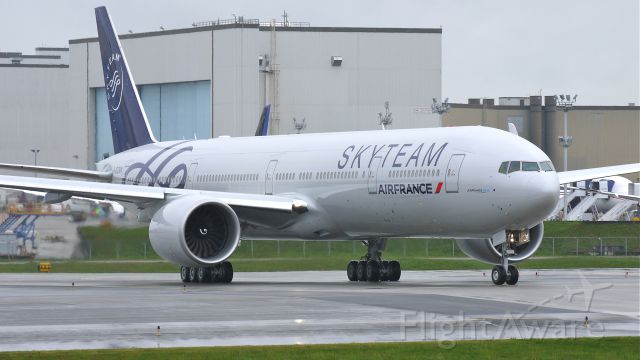 BOEING 777-300 (F-GZNN) - BOE253 (LN:1013) taxis onto runway 16R for a fast taxi test on 5/3/12.