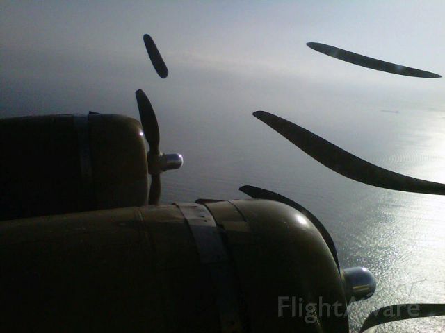 23-1909 — - Taken over Southern California Coast - Numbers 1 and 2 shot with a blackberry camera - interesting effect on the turning prop blades.  