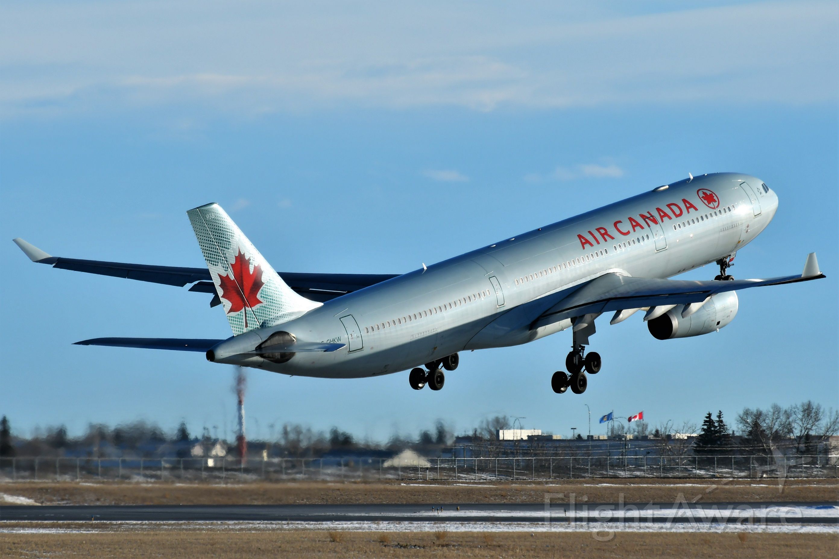 Airbus A330-300 (C-GHKW) - Air Canada Airbus A330-343 departing YYC on Dec 29.