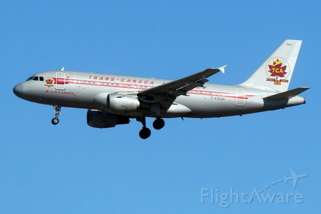 Airbus A319 (C-FZUH) - Ait canadas retro jet arriving from Vancouver