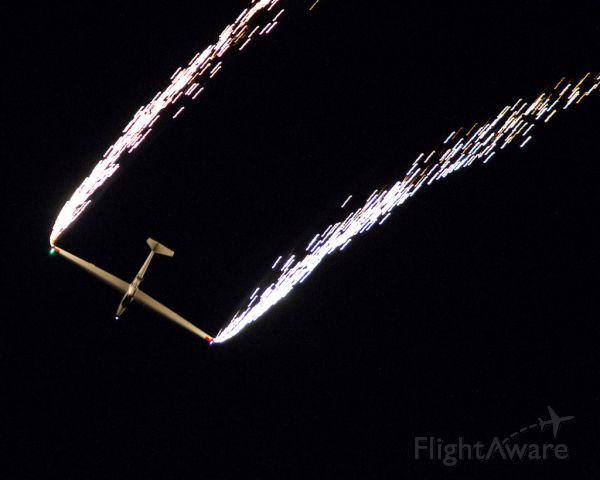 N101AZ — - Bob Carlton leaves a trail of sparks during his "Fire & Lights" night show routine in his world's only jet powered Super Salto sailplane.