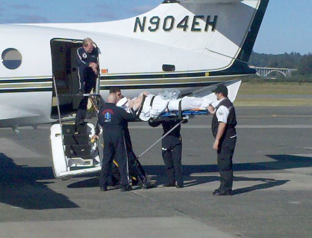 British Aerospace Jetstream 31 (N904EH) - Air Ambulance Team loading a patient.