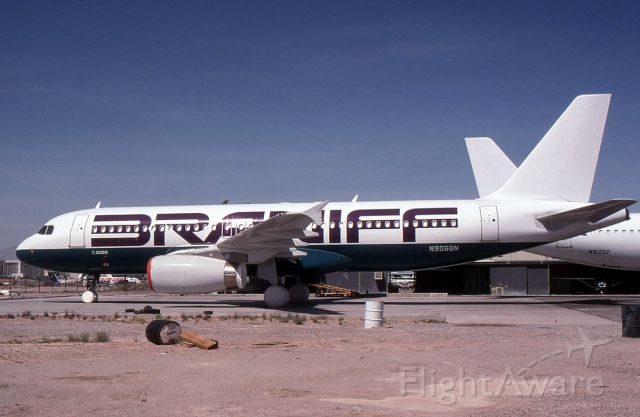 Airbus A320 (N906BN) - Brand new A320 N906BN in the colors of Braniff Airlines stored at Las Vagas in 1990. It was not delivered but ended up with America West Airlines after storage.