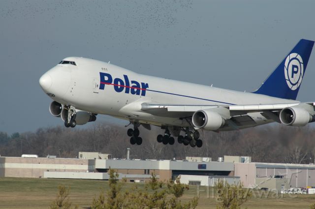 Boeing 747-400 (N453PA) - polar 946 heavy landing on 18L with a flock of birds    this photo was picked by the staff    I can be reached at Truck10FMFD@aol.com for questions or comments