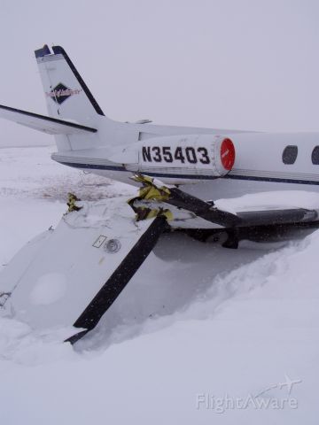 Cessna 551 Citation 2SP (N35403) - Rough landing at  KANW full of ice