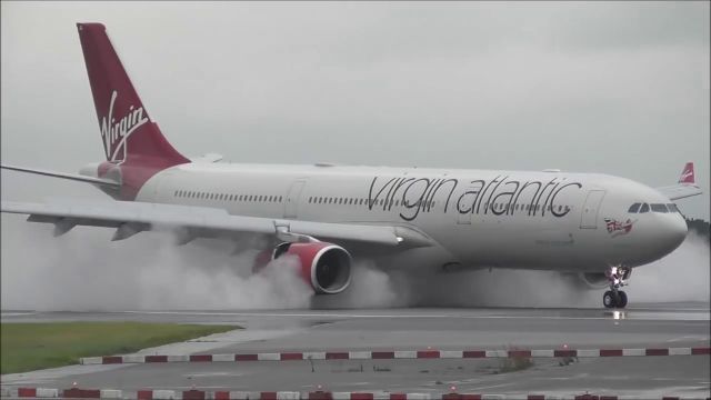 Airbus A330-300 (G-VWAG) - RW23R landed in a raining day from Bridgetown Barbados Island