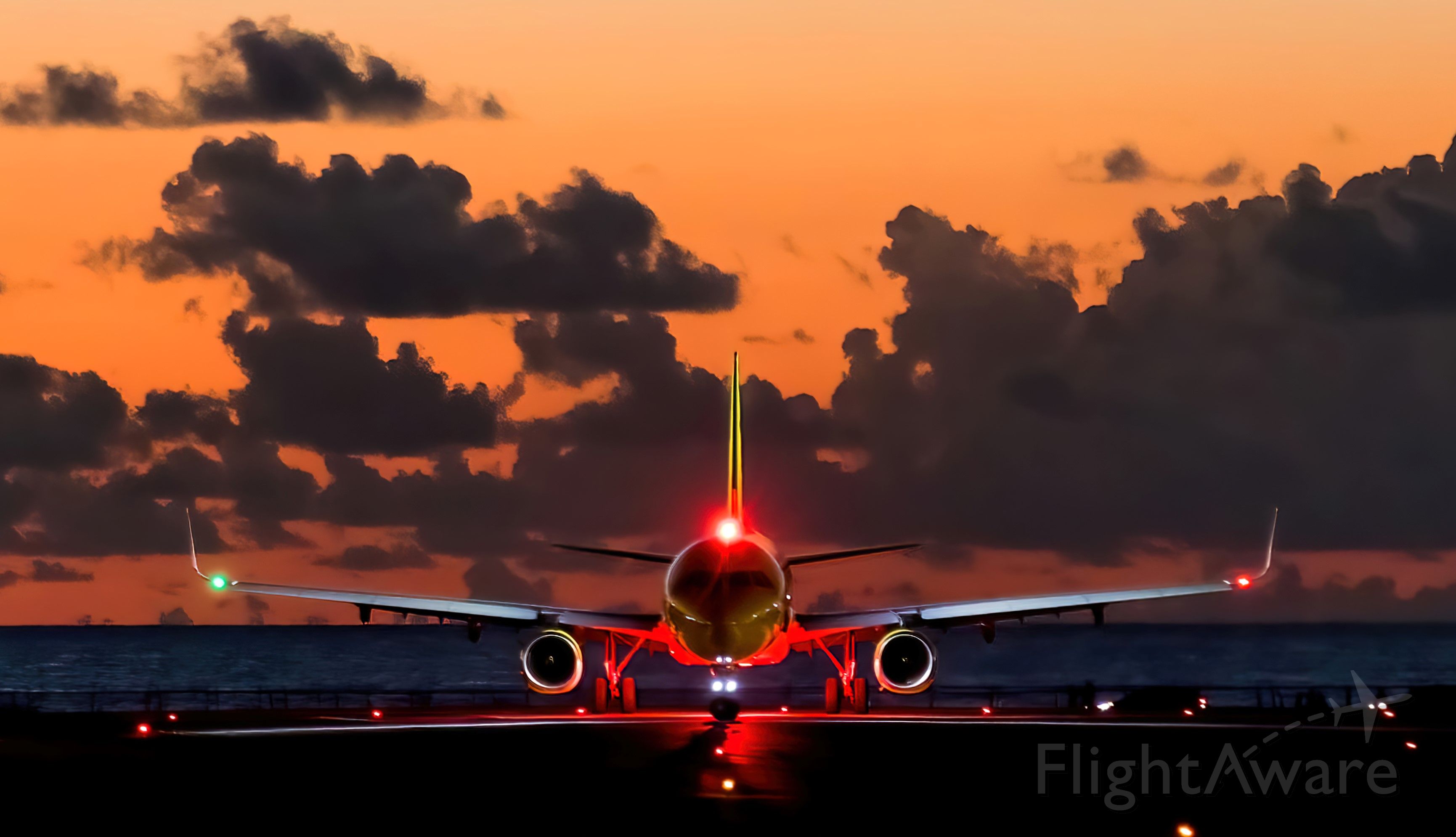 Airbus A321 — - Spirit wings departing St Maarten at sunset.