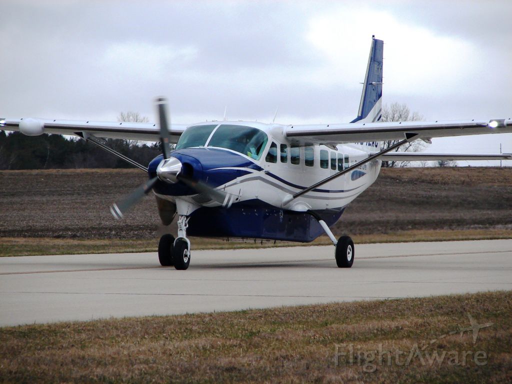 Cessna Caravan (N942AC) - WBR(Air Choice One) taxiing in at KMCW