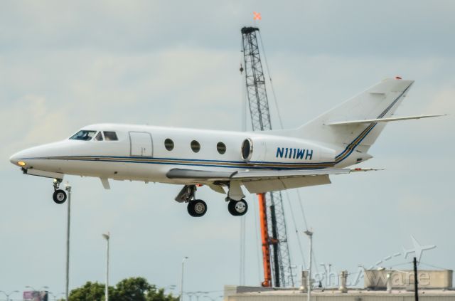 Dassault Falcon 10 (N111WH) - Could there be a rock star on board? That was the hope as this was shot on opening day of week two of the Austin City Limits Music Festival.