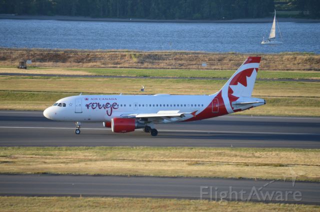 Airbus A319 (C-GITR) - ROU1841 vacating 28R after arriving from Toronto-Pearson (CYYZ/YYZ). This marks Air Canada's reinstatement of their seasonal-daily flights between Portland, Oregon and Toronto for 2019. This flight also marks first day of Air Canada Rouge operations into PDX as this route was previously operated by Air Canada's mainline E-190s. Air Canada announced the transfer of the PDX-YYZ route to their Rouge subsidiary in March 2019.