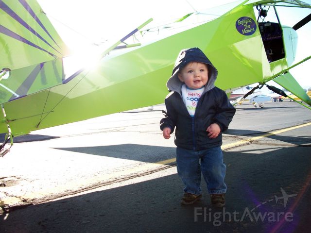 — — - Enjoying the Moment....Just Highlander taken with my 1 year old at the EAA fly-in breakfast.