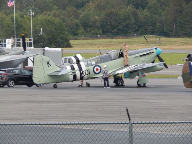 FAIREY Firefly (N518WB) - A Fairey Firefly sits on the ramp at Culpeper Reginal Airport in 2020 for the WWII flyover. It was cancelled a few days later due to rain.