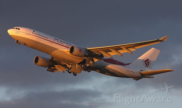 Airbus A330-200 (7T-VJW) - Take off at sunset.