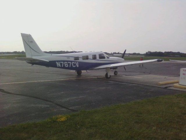 Piper Saratoga (N767CV) - Sitting around at the FBO and this gorgeous Saratoga rolled up.. unfortunately all I had was the camera on my cell phone..