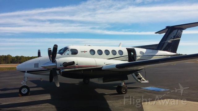 Beechcraft Super King Air 200 (N25WC) - Parked outside the door of Destin Jet