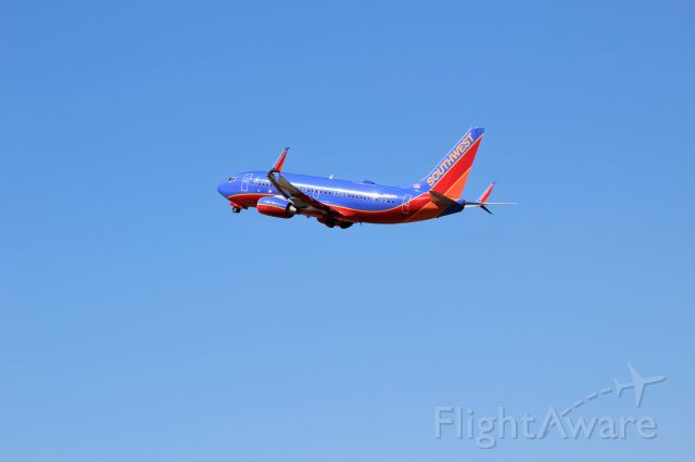 Boeing 737-700 (N963WN) - Taking off from MSP on Sunday June 4 with blue skies. 