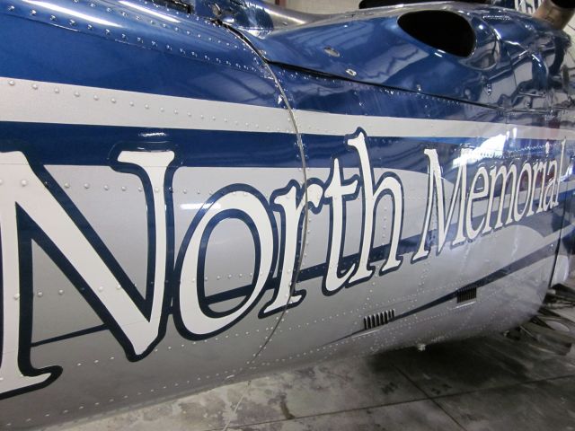 N911D — - North Memorial Air Care 1. Tail shot in hanger at AirLake, Lakeville, MN.