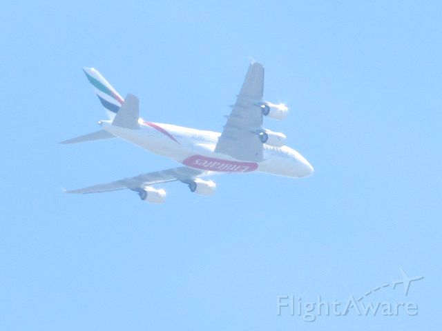 — — - Emirates big whale finals into Pearson International being viewed from my verandah in Brampton