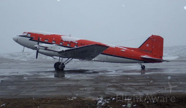 Douglas DC-3 (turbine) (C-FMKB) - Snowing in Iqaluit, Nunavut on June 19, 2015