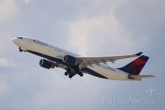 Airbus A330-200 (N858NW) - A Delta A330 off to Amsterdam! Taken from the SLC parking garage.