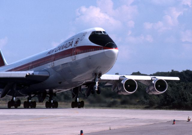 Boeing 747-200 (C-FTOE) - November 1980 - C-FTOE, #305, rotates on rwy 29 at Ymx.