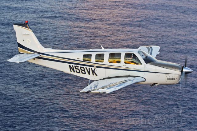 Beechcraft Bonanza (36) (N59VK) - Air to Air with Felix Bahamonde near San Juan area.  a rel=nofollow href=http://www.fnairphoto.comwww.fnairphoto.com/a
