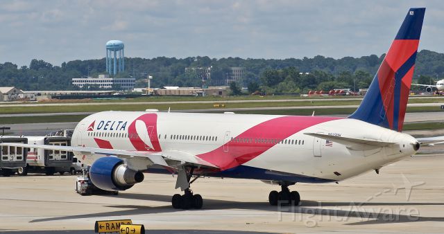 BOEING 767-400 (N845MH) - Deltas BCRF 767 rolls by the DL Sky Club in Concourse F, where I was.