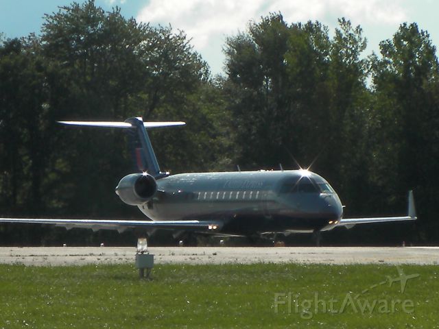 Canadair Regional Jet CRJ-200 (N948SW) - Taking off from London International Airport runway 33