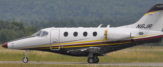 Beechcraft Premier 1 (N6JR) - N6JR on taxi for takeoff, July 15, 2012 at KCON, after the NASCAR race at Loudon, NH.