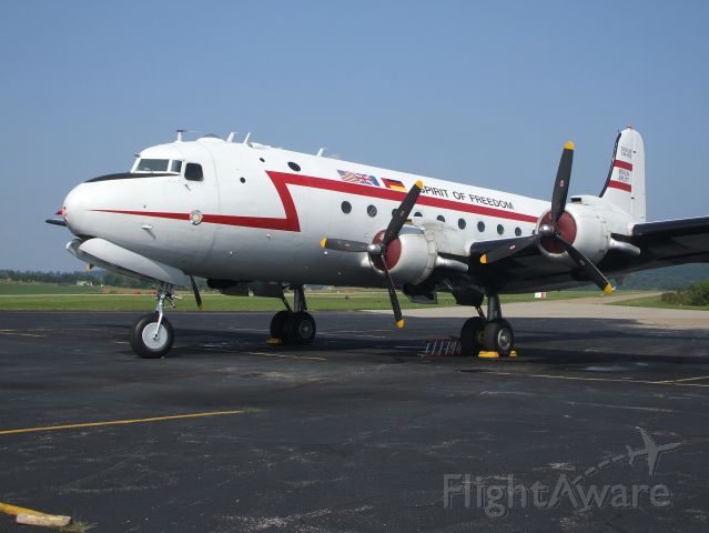 Douglas C-54 Skymaster (N500EJ) - Douglas C-54 (Spirit of Freedom) parked on main ramp at Washington County Airport.